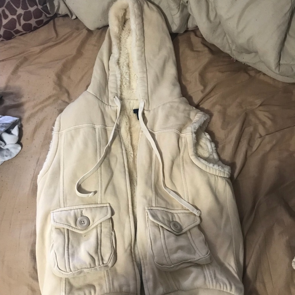 GAP faux fur lined hooded vest.